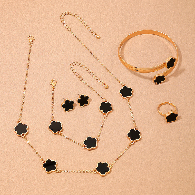 Clover Blossom Metal Jewelry Set with Necklace, Bracelet, and Earrings