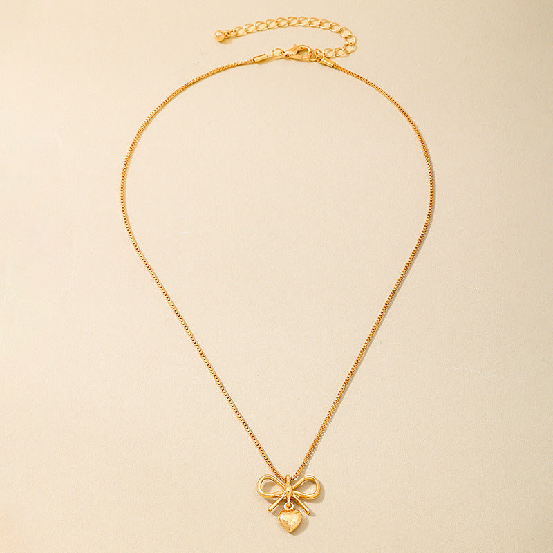 Planderful Vienna Verve Necklace – Elegant Metal Bow Design