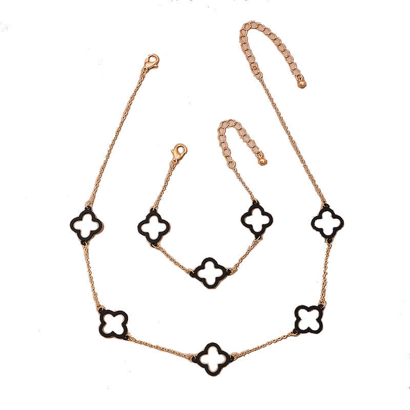 Stylish Modern Black Hollow Clover Metal Jewelry Set with Necklace and Bracelet
