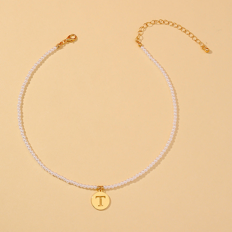 Elegant Hollow English Letter Pendant Necklace with Pearl Accents