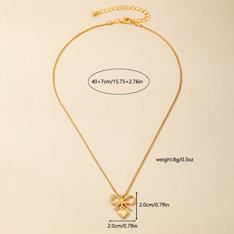 Planderful Vienna Verve Necklace – Elegant Metal Bow Design