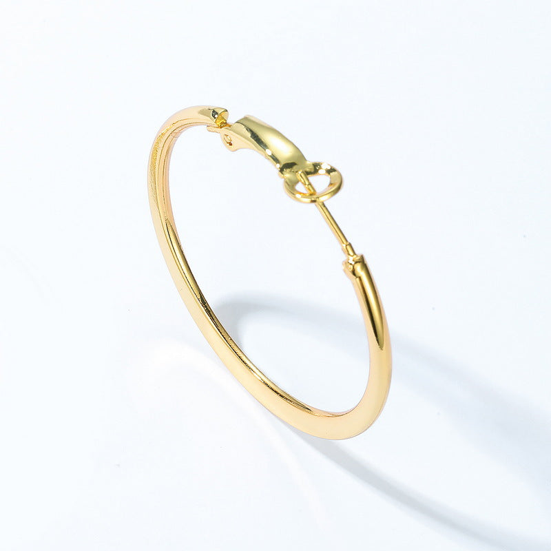 Gold-Tone Curved Metal Hoop Earrings