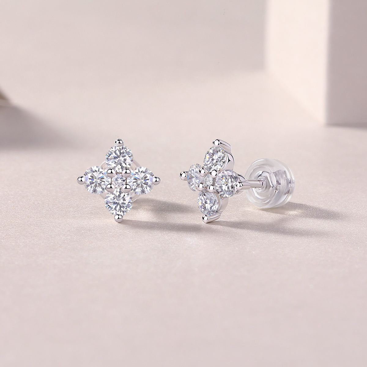 S925 Silver Plated 18K Platinum Four Petals Flower Stud Earrings with 0.85 Carat Small Round Moissanite