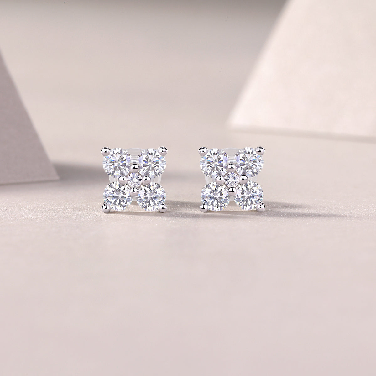 S925 Silver Plated 18K Platinum Four Petals Flower Stud Earrings with 0.85 Carat Small Round Moissanite