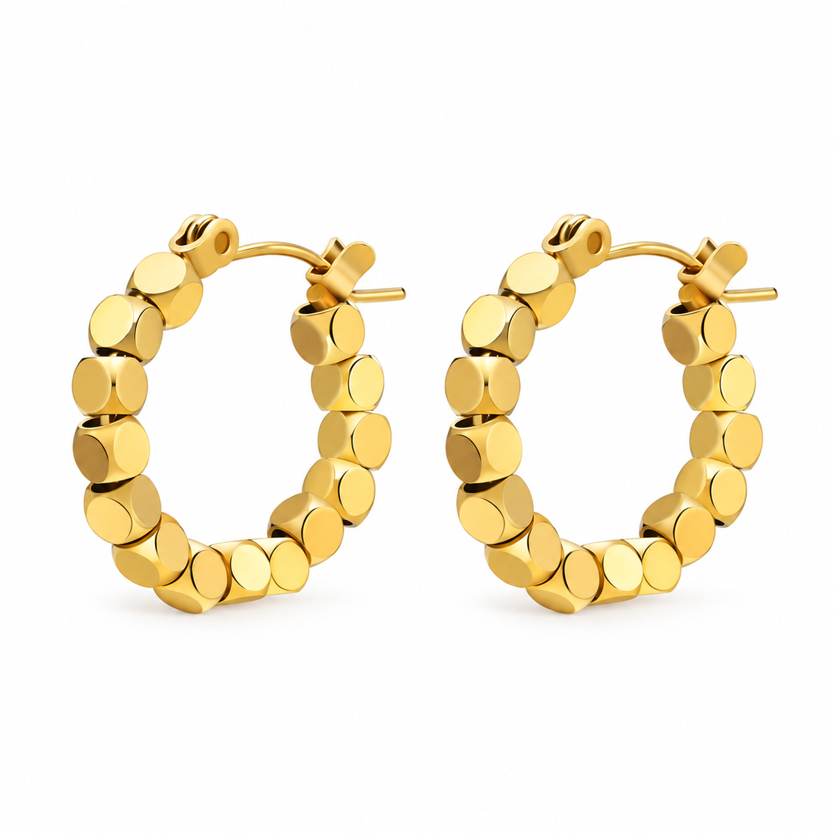 Gold-tone disc hoop earrings on white background