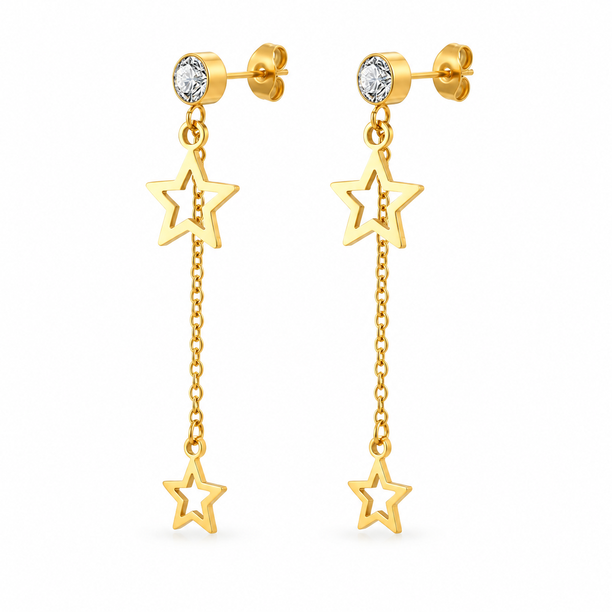 Gold-tone crystal star chain drop earrings on pure white background