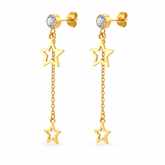Gold-tone crystal star chain drop earrings on pure white background