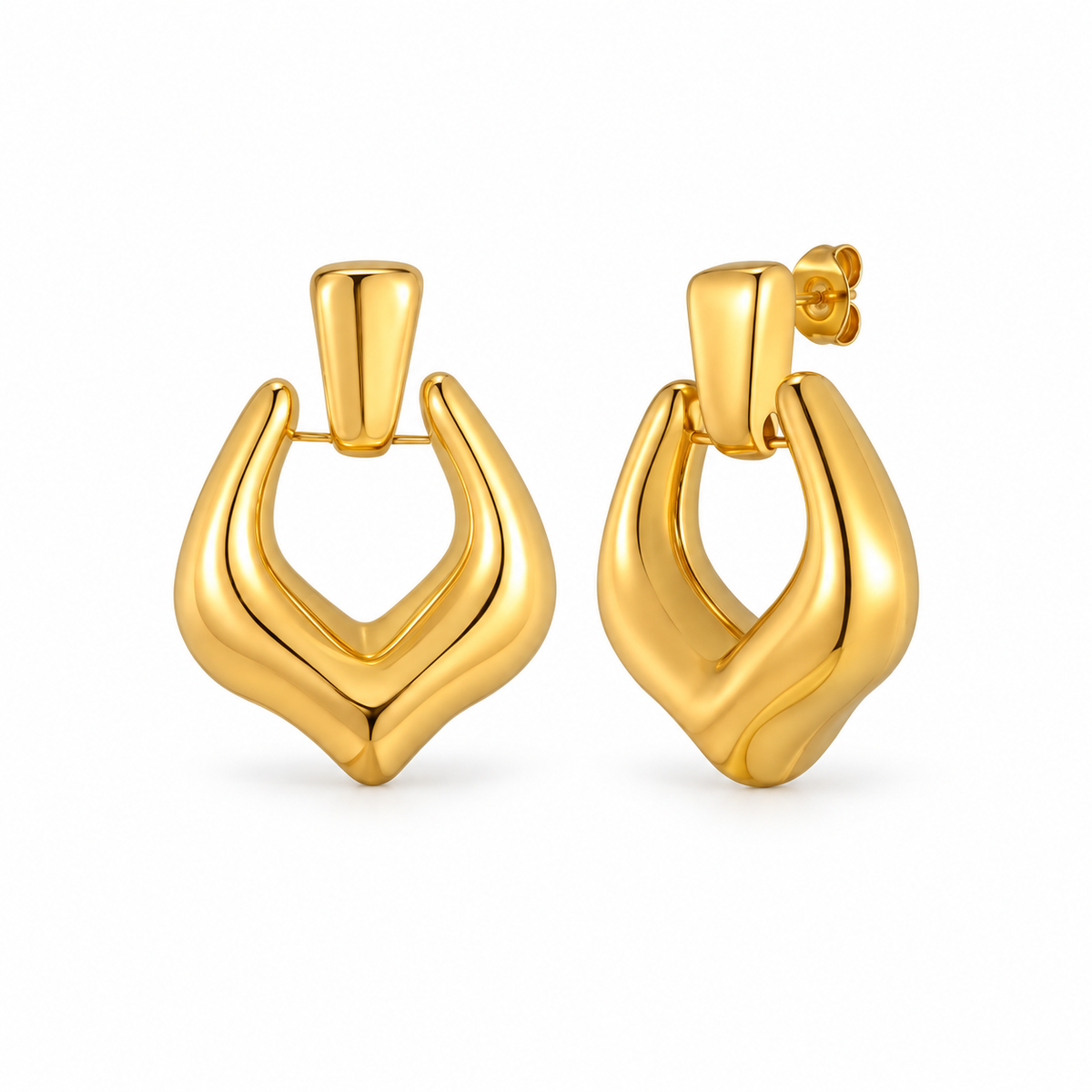 Gold-tone sculptural teardrop stud earrings on pure white background
