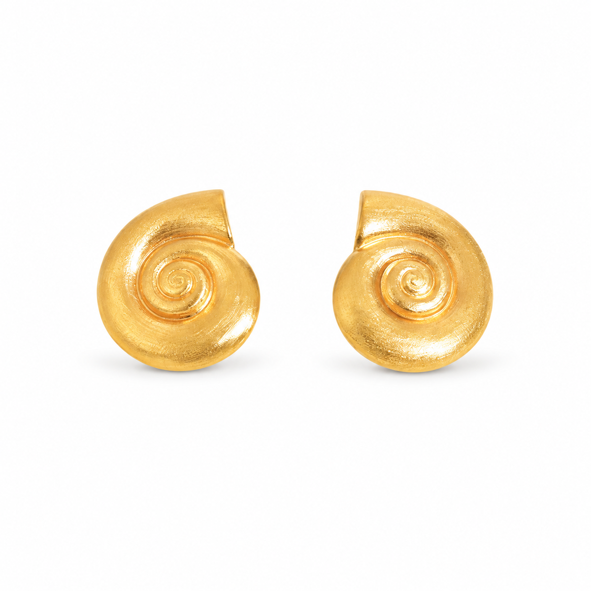 Matte gold-tone spiral shell stud earrings on pure white background