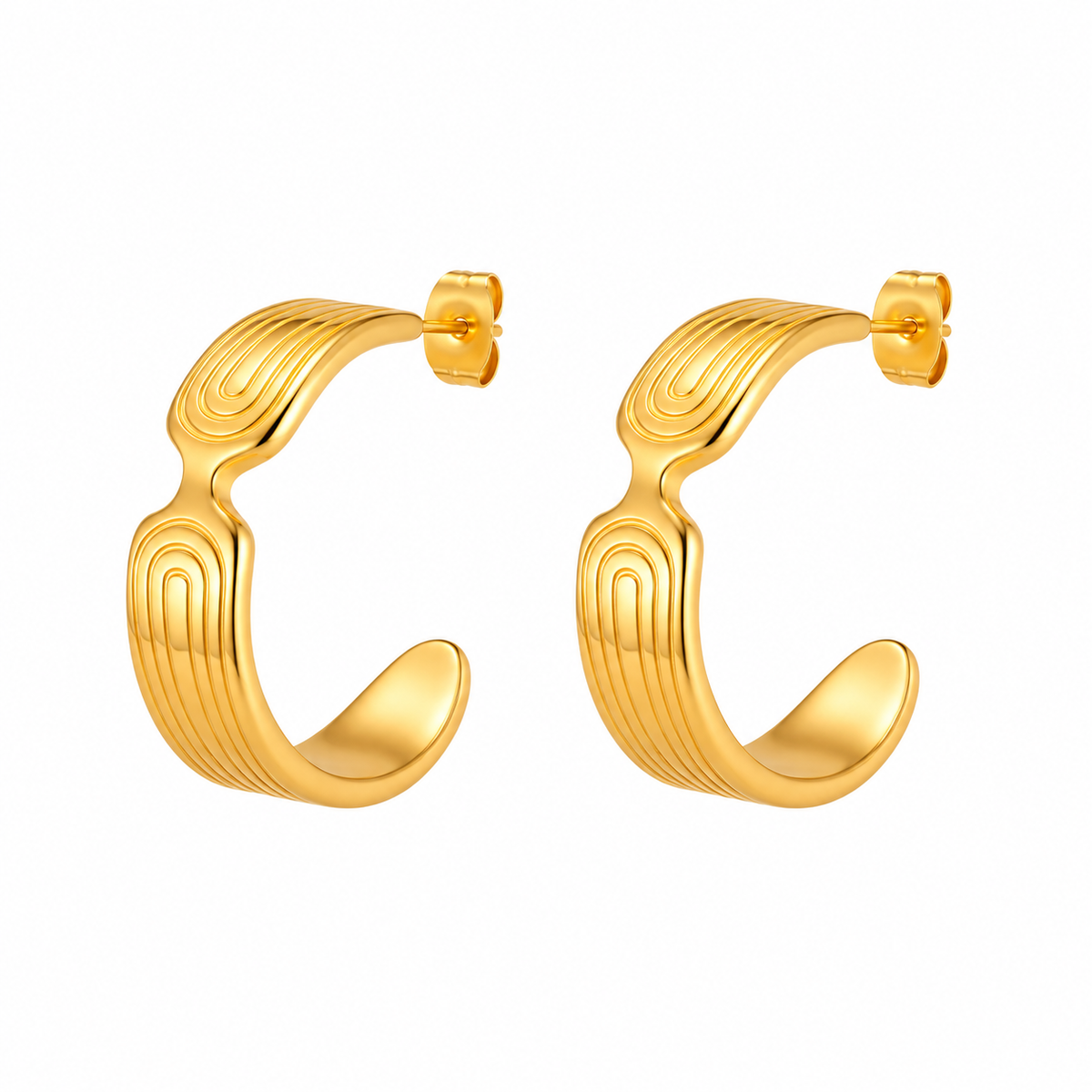 Gold-tone sculptural grooved open hoop earrings on white background