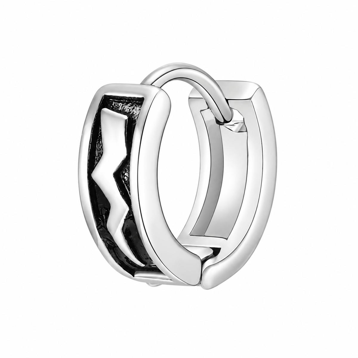 Silver-tone black zigzag huggie earring on white background