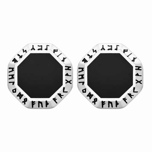 Silver-tone Viking rune stud earrings with black centers on white background