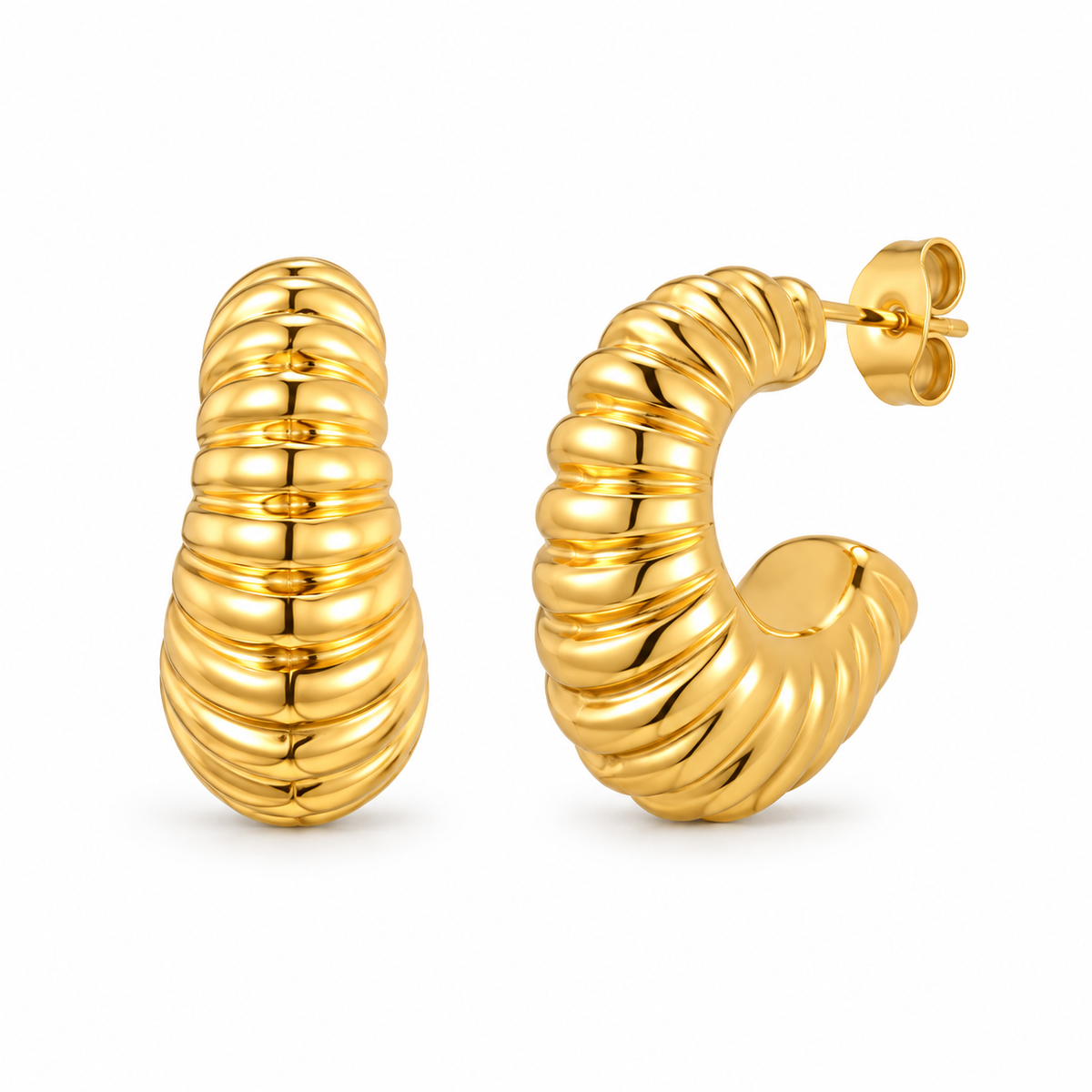 Gold-tone ribbed croissant hoop earrings on a pure white background