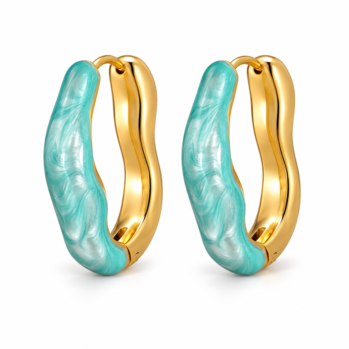 Gold-tone sculptural hoop earrings with turquoise enamel on a pure white background