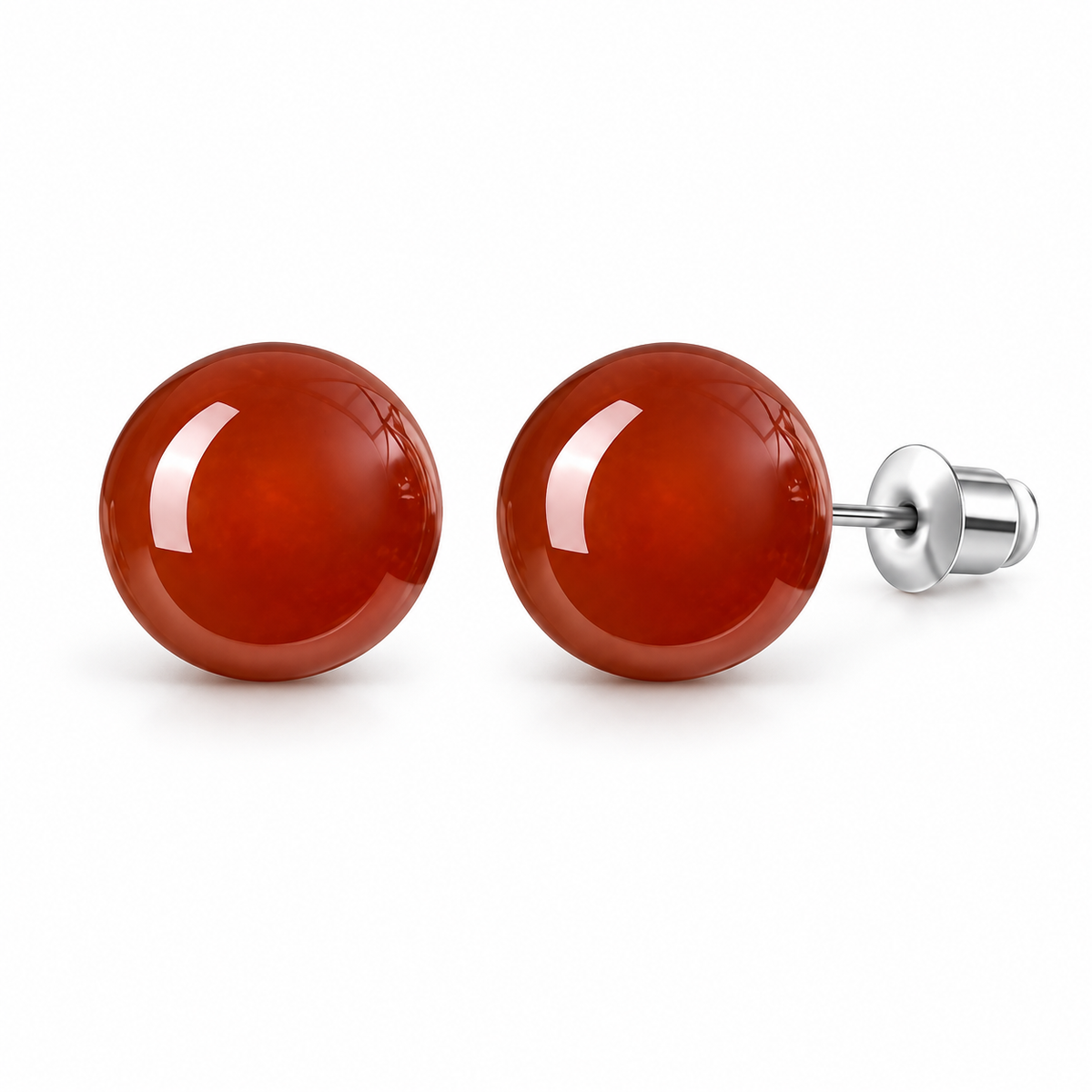 Deep red round gemstone stud earrings on a pure white background