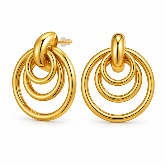 Gold-tone layered geometric circle drop earrings on white background