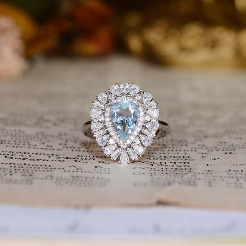 Sky Blue Natural Topaz 6*9mm Water Droplet Soleste Halo Silver Ring for Women