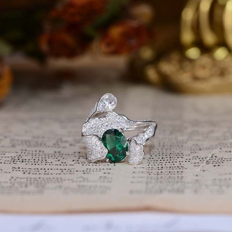 Lab-Created Emerald 7*9mm Oval Ice Cut Waves Luxurious Silver Ring for Women