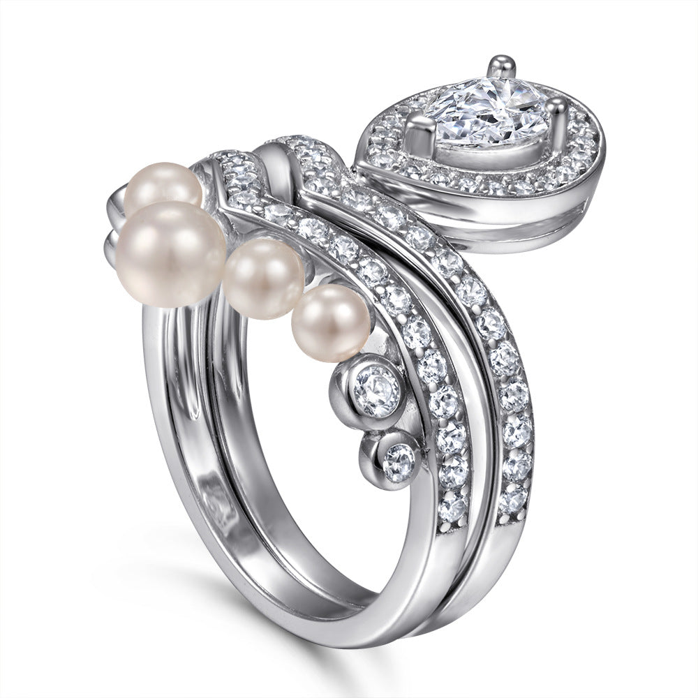 Pear Drop Zircon Soleste Halo with Pearl V-shape Silver Ring Set