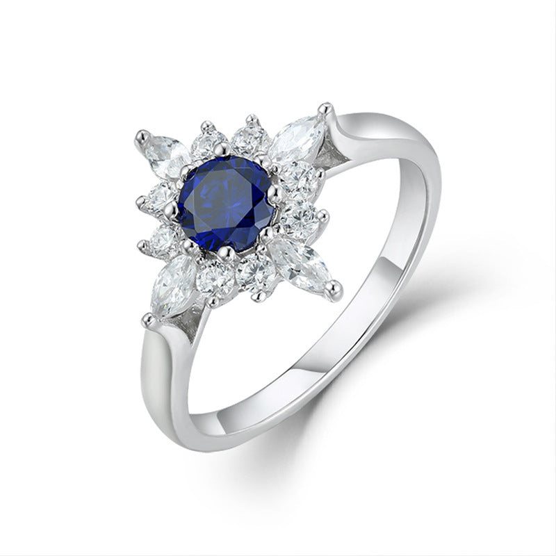 Round Cut Blue Zircon Flower Halo Silver Ring