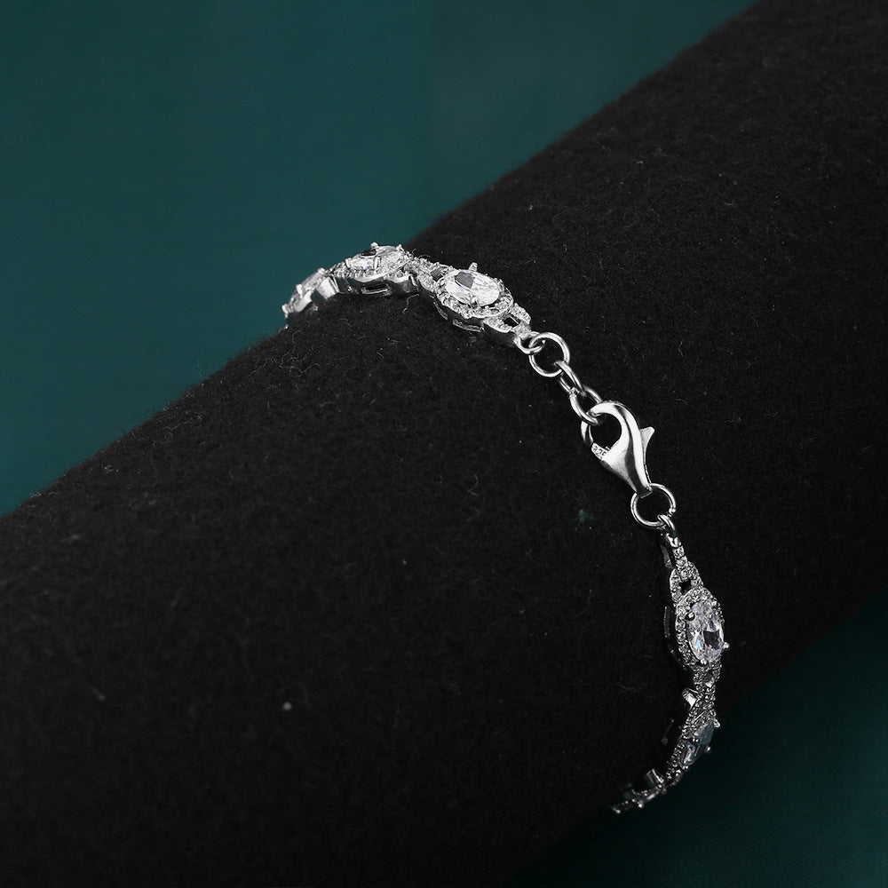 Oval Zircon Soleste Halo Beaded Interlock Silver Bracelet for Women