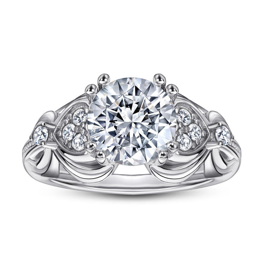 Sumptuous Round Zircon with Heart Pattent Split Shank Silver Ring