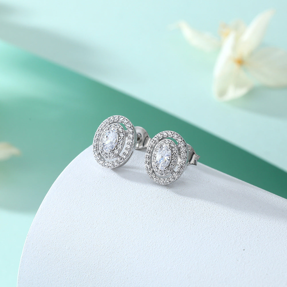 Sumptuous Oval Zircon Soleste Halo Silver Studs Earrings for Women