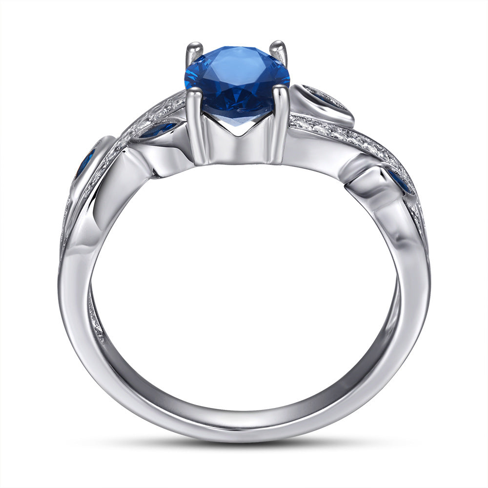 Blue Oval Zircon with Hollow Pattern Silver Ring for Women