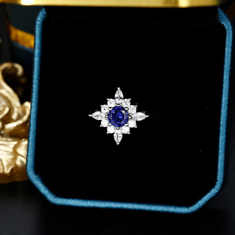 Round Cut Blue Zircon Flower Halo Silver Ring