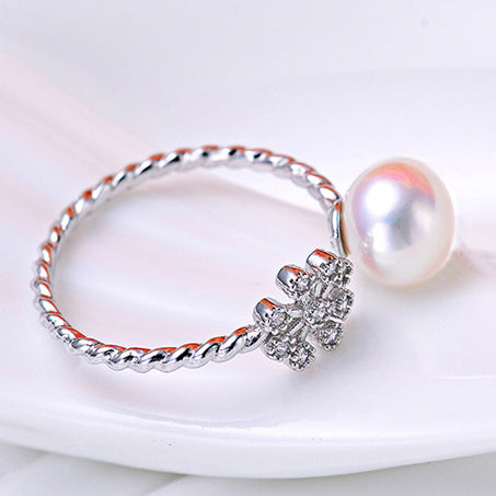 Snowflake with Pearl Opening Twist Silver Ring